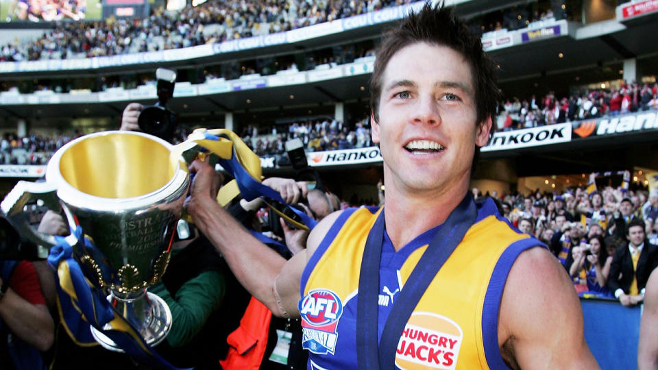 Ben Cousins is pictured celebrating after winning the 2006 AFL premiership with the West Coast Eagles.