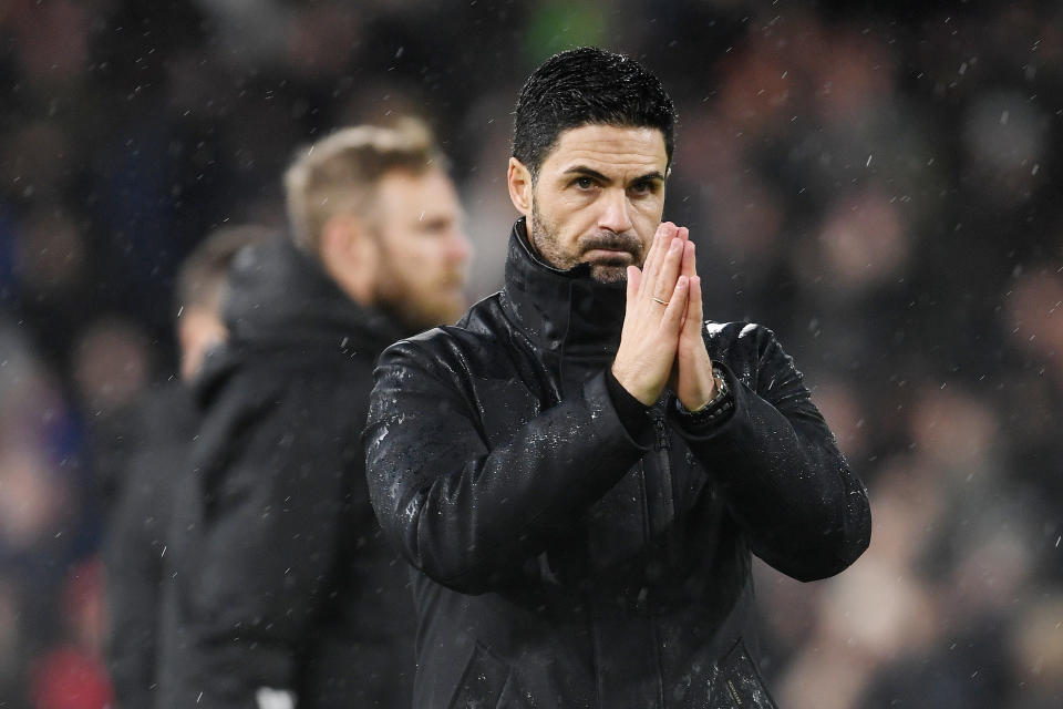 LONDON, ENGLAND - DECEMBER 31: Mikel Arteta, Manager of Arsenal, applauds the fans after the team's defeat in the Premier League match between Fulham FC and Arsenal FC at Craven Cottage on December 31, 2023 in London, England. (Photo by Stuart MacFarlane/Arsenal FC via Getty Images)