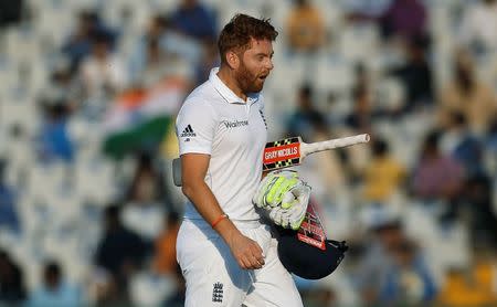 Cricket - India v England - Third Test cricket match - Punjab Cricket Association Stadium, Mohali, India - 26/11/16. England's Jonny Bairstow reacts as he walks off the field after his dismissal. REUTERS/Adnan Abidi