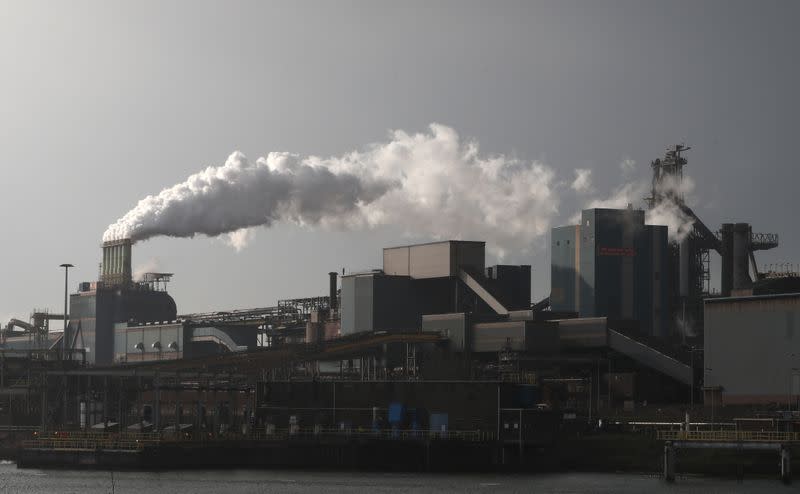 Smoke is seen coming out of a chimney at the Tata steel plant in Ijmuiden