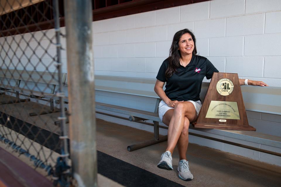 Calallen head softball coach Teresa Lentz sits with the Class 4A championship trophy at the high school on June 15, 2023, in Corpus Christi, Texas. Lentz is the 2023 All-South Texas Softball Coach of the Year.