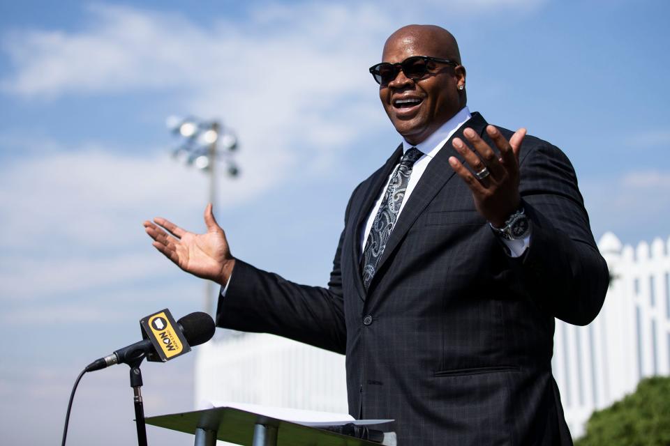 Major League Baseball Hall of Famer Frank Thomas answers questions from the press about his purchase of the Field of Dreams movie site during a news conference, on Thursday, Sep. 30, 2021, on the field, outside of Dyersville, Iowa. 