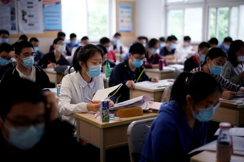 FILE PHOTO: Students are seen inside a classroom at a high school in Shanghai