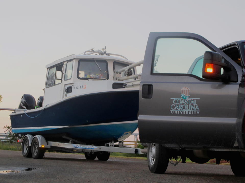 A boat from Coastal Carolina University is prepared for launch into Charleston Harbor in South Carolina from Mount Pleasant, S.C., on Friday, October 12, 2012. Researchers from the university are conducting a survey of the bottom of Charleston Harbor as part of a planned $300 million harbor deepening project. (AP Photo/Bruce Smith).