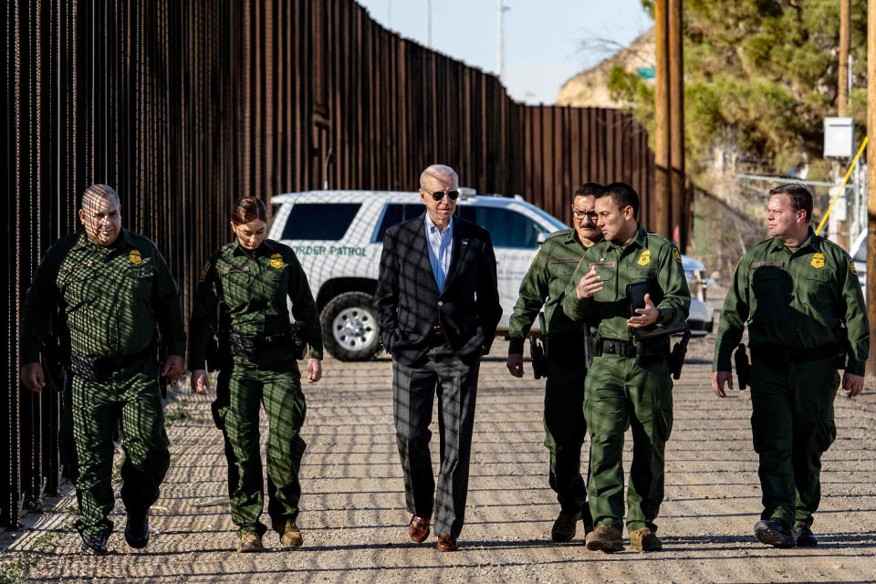 President Joe Biden speaks with US Customs and Border Protection officers as he visits the U.S.-Mexico border in El Paso, Texas, on Jan. 8, 2023. (Jim Watson / AFP via Getty Images file)