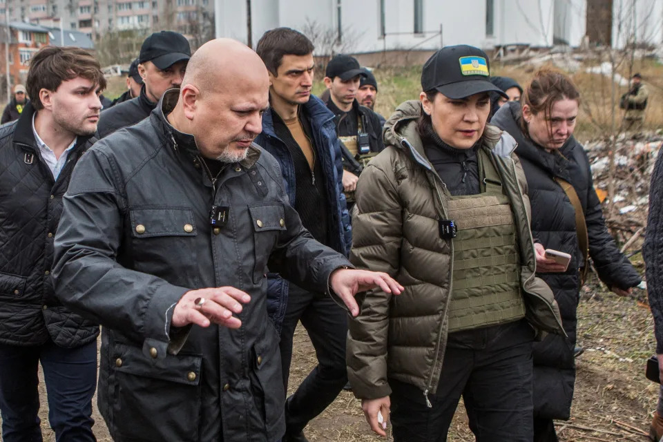 International Criminal Court (ICC) Prosecutor Karim Khan and Ukraine's Prosecutor General Iryna Venediktova visit a site of a mass grave in the town of Bucha, outside Kyiv, Ukraine April 13, 2022. REUTERS/Volodymyr Petrov