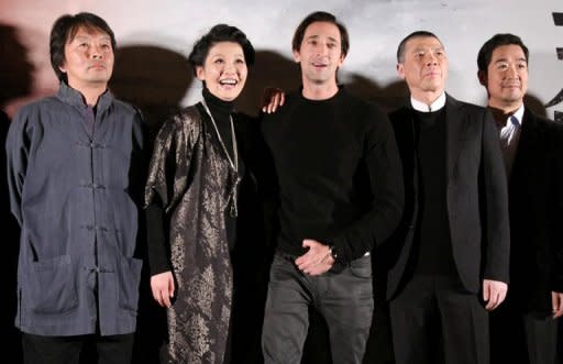 Chinese screenwriter Liu Zhenyun, actress Xu Fan, American actor and film producer Adrien Brody, Chinese director Feng Xiaogang and actor Zhang Guoli (L-R) pose for the media during a press conference of Feng Xiaogang's epic "Back to 1942" movie premiere in Beijing on November 25, 2012. The film had a 210-million-yuan ($34 million) budget