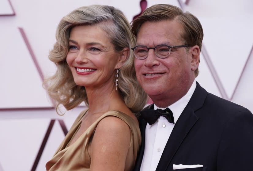 Paulina Porizkova and Aaron Sorkin arrive at the Oscars on April 25, 2021