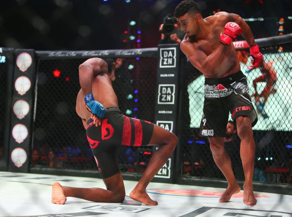 May 11, 2019; Rosemont, IL, USA;  Douglas Lima (red gloves) knocks out Michael Page (blue gloves) during Bellator 221 at Allstate Arena. Mandatory Credit: Jerry Lai-USA TODAY Sports