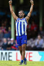 Happy days: Lindsay Thomas celebrates the big win over Sydney