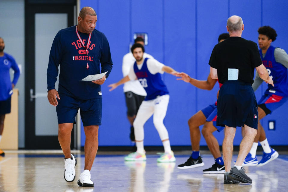 Philadelphia 76ers head coach Doc Rivers watches practice at the NBA basketball team's facility, Monday, Oct. 18, 2021, in Camden, N.J. (AP Photo/Matt Rourke)