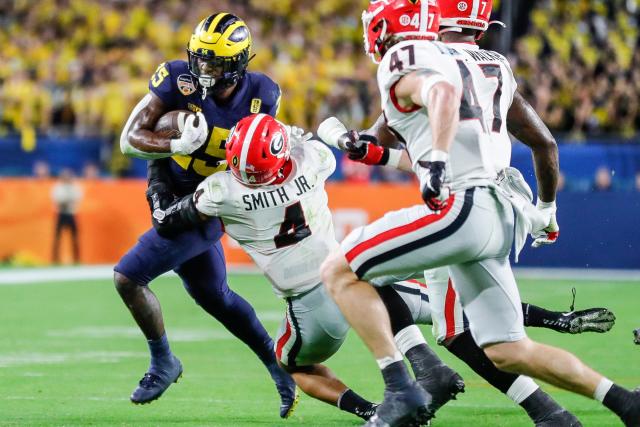 Grading the Tennessee Titans pick of Michigan's Hassan Haskins at