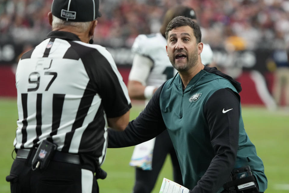 Philadelphia Eagles head coach Nick Sirianni speaks with an official during the second half an NFL football game against the Arizona Cardinals, Sunday, Oct. 9, 2022, in Glendale, Ariz. (AP Photo/Rick Scuteri)