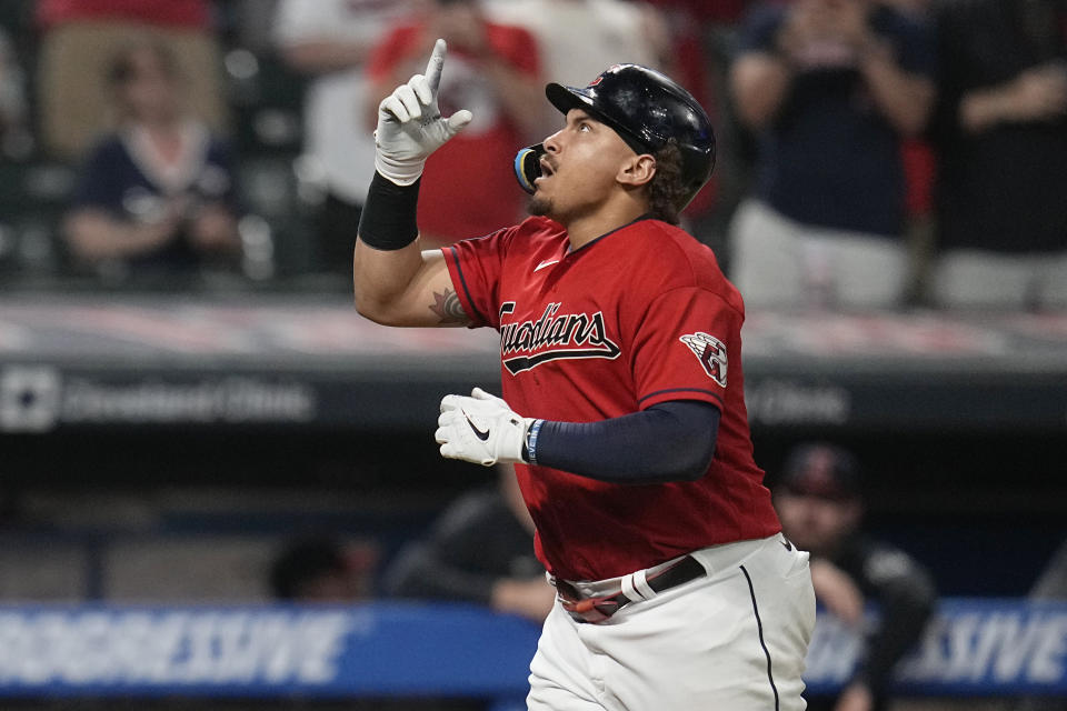 Cleveland Guardians' Josh Naylor gestures while approaching the plate on a home run against the Kansas City Royals during the sixth inning of a baseball game Thursday, July 6, 2023, in Cleveland. (AP Photo/Sue Ogrocki)