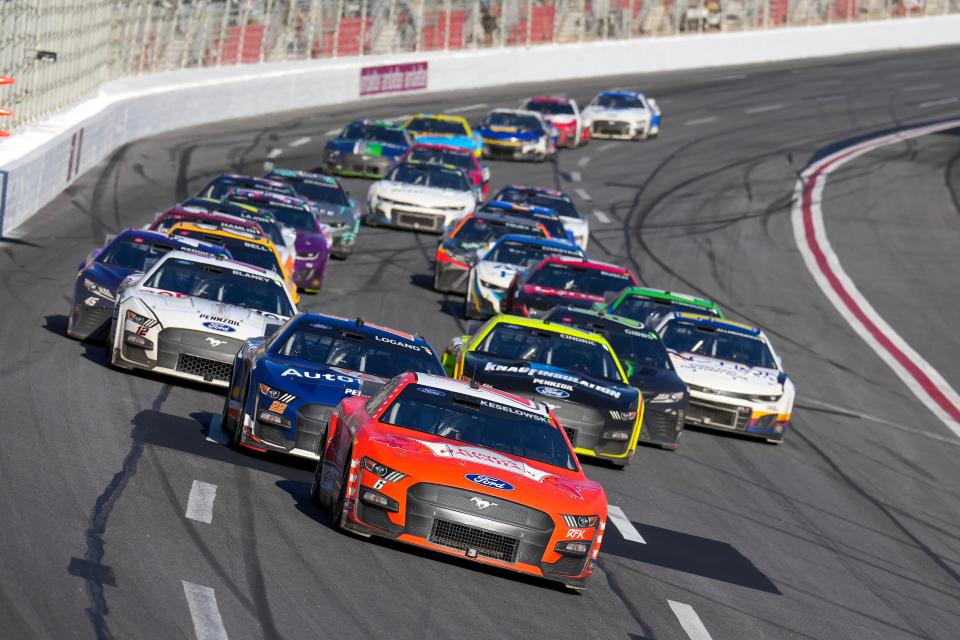 Brad Keselowski, front, leads Joey Logano going into Turn 1 at Atlanta Motor Speedway during the March 19, 2023 race.