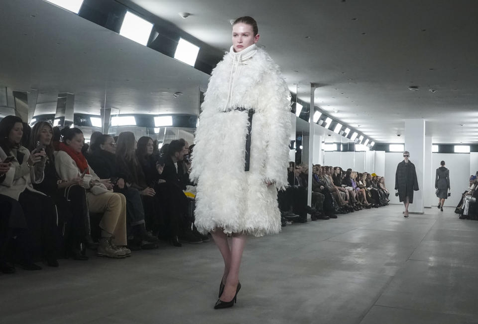 Fashion from Michael Kors fall/winter collection is modeled during Fashion Week, Tuesday, Feb. 13, 2024, in New York. (AP Photo/Bebeto Matthews)