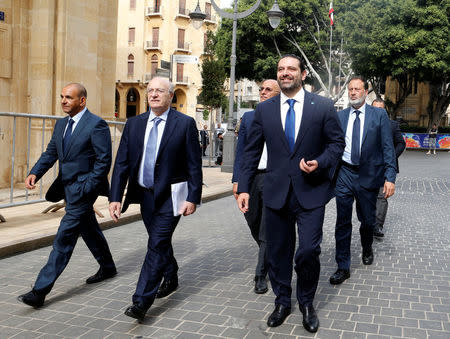 Prime Minister-designate Saad al-Hariri walks as he leaves the parliament building at downtown Beirut, Lebanon May 28, 2018. REUTERS/Mohamed Azakir