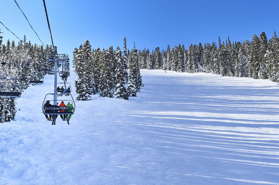 people on a ski lift