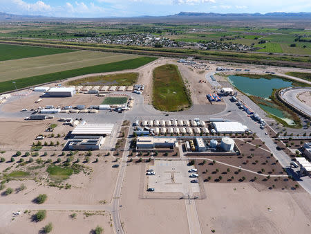 A tent city set up to hold immigrant children separated from their parents or who crossed the U.S. border on their own, is seen inTornillo, Texas, U.S., in this U.S. Department of Health and Human Services (HHS) image released on October 12, 2018. Courtesy HHS/Handout via REUTERS