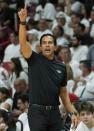 Miami Heat head coach Erik Spoelstra gestures during the second half of Game 1 of an NBA basketball Eastern Conference finals playoff series against the Boston Celtics, Tuesday, May 17, 2022, in Miami. (AP Photo/Lynne Sladky)