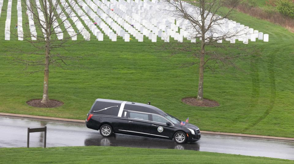 The hearse carrying the remains of U.S. Navy Fireman 1st Class Walter Schleiter of Massillon enters National Cemeteries of the Alleghanies in Bridgeville, Pennsylvania.