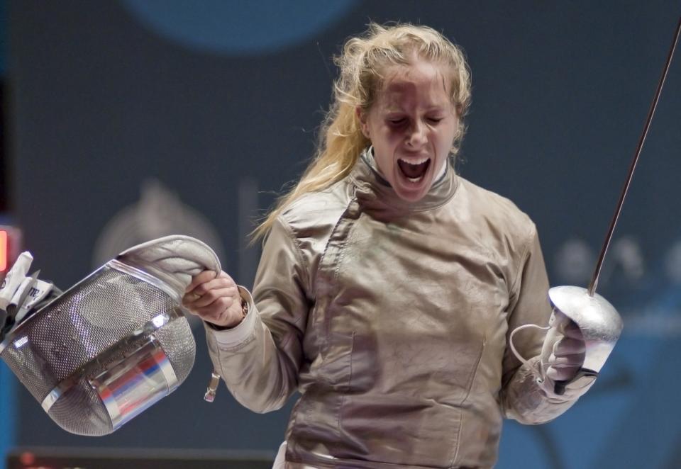 Mariel Zagunis of USA celebrates her final point against Alejandra Benitez of Venezuela in the women's individual sabre gold medal match during the Guadalajara 2011 Pan American Games, at the Fencing stadium in Guadalajara, Mexico, on October 25, 2011. Zagunis won 15-13. AFP PHOTO/OMAR TORRES (Photo credit should read OMAR TORRES/AFP/Getty Images)