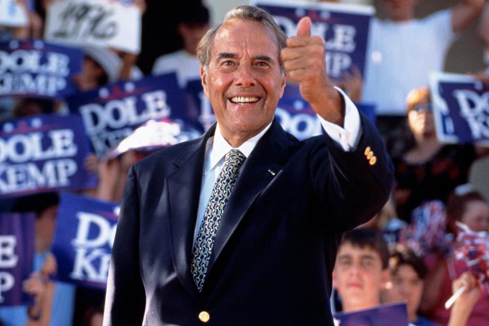 Senator Bob Dole gives the &quot;thumbs up&quot; sign during a presidential rally. Senator Dole won the Republican nomination for president in 1996.