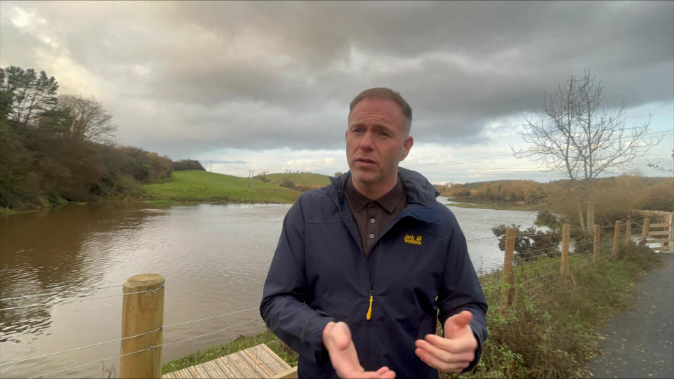 Sinn Fein MP Chris Hazzard at the edge of the River Quoile (Claudia Savage/PA)