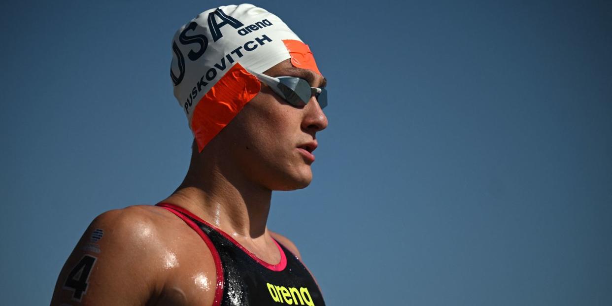 us' ivan puskovitch arrives for the start of the final of the men's 10km open water swimming event during the 2024 world aquatics championships at doha port in doha on february 4, 2024 photo by oli scarff  afp