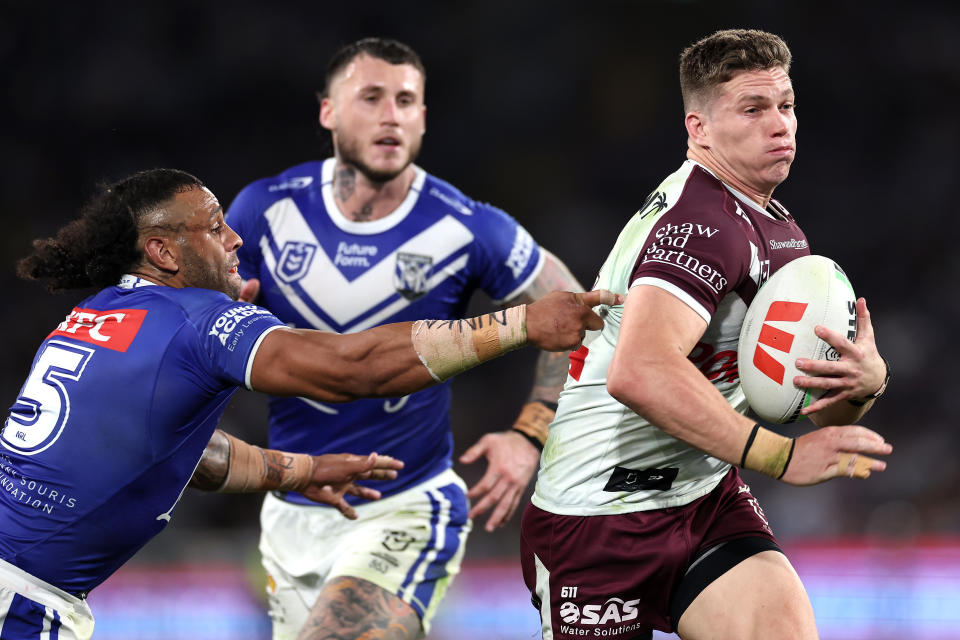 The Bulldogs and Sea Eagles in action during an NRL game.