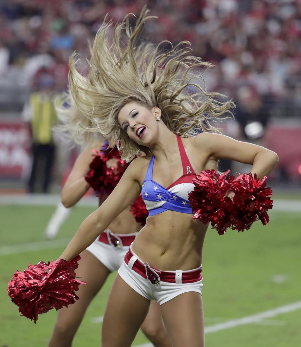 <p>The Arizona Cardinals cheerleaders perform during the first half of an NFL football game against the San Francisco 49ers, Sunday, Nov. 13, 2016, in Glendale, Ariz. (AP Photo/Rick Scuteri) </p>