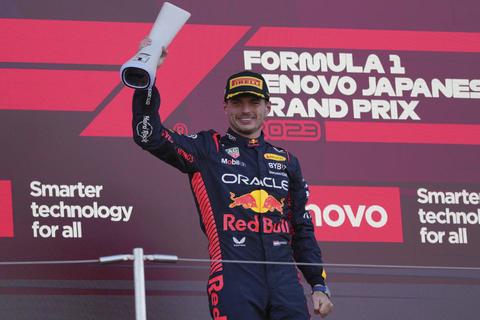 Red Bull driver Max Verstappen of the Netherlands celebrates on the podium after winning the Japanese Formula One Grand Prix at the Suzuka Circuit, Suzuka, central Japan, Sunday, Sept. 24, 2023. (AP Photo/Toru Hanai)