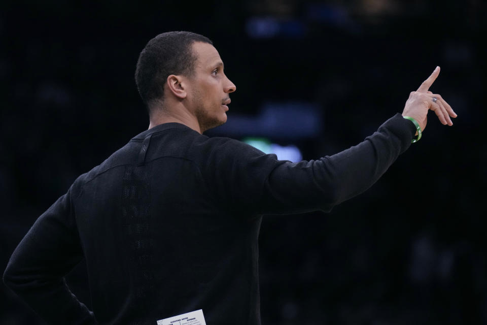 Boston Celtics head coach Joe Mazzulla calls to his players during the first half of an NBA basketball game against the Philadelphia 76ers, Tuesday, Feb. 27, 2024, in Boston. (AP Photo/Charles Krupa)