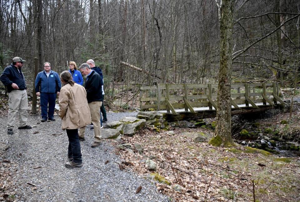 A group gathers to chat about the Musser Gap Trail on Thursday.