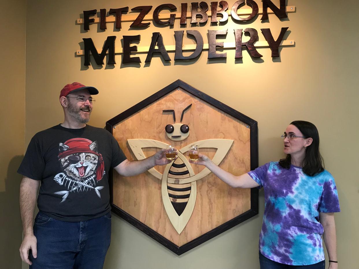 Eric and Misa McAnallen share a toast at their Fitzgibbon Meadery opening in Ellwood City. Similar to a winery, their Lawrence Avenue business will feature homemade meads.