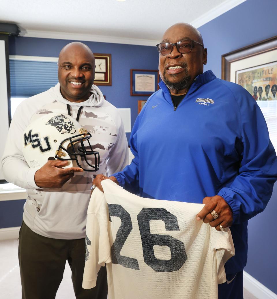 Former Memphis football player Glenn Rogers Sr., the first Black player to integrate the team, with his son Glenn Jr. who played for Memphis State from '87-90, at his South Memphis home on Tuesday, March 1, 2022. "I'm really proud to see him persevere through all the stuff he went through. It makes me proud to know that he opened the door for so many of us to come behind," said Rogers Jr.