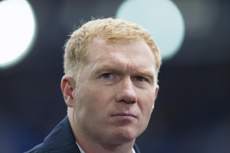 FILE - In this Saturday Sept. 12, 2015 file photo, Paul Scholes as a television commentator prior to the English Premier League soccer match between Everton and Chelsea at Goodison Park Stadium, Liverpool, England. Former Manchester United midfielder Paul Scholes has landed his first managerial job at hometown team Oldham in the fourth tier. (AP Photo/Jon Super, File)