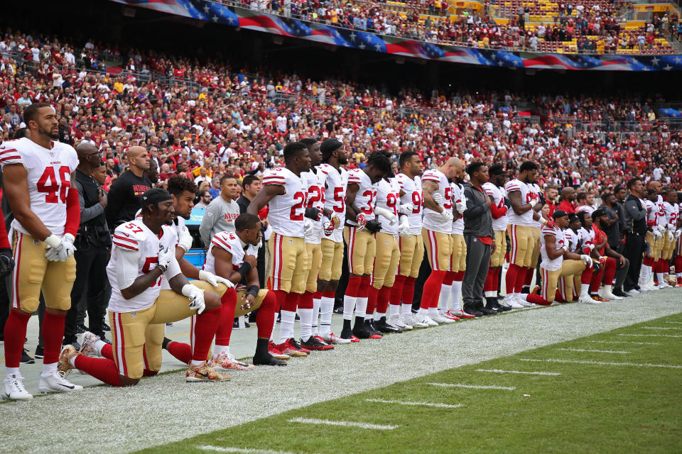 Six active members of the San Francisco 49ers and one inactive player took a knee during the national anthem as a gesture of protest against racial injustice. (Photo: USA Today Sports / Reuters)