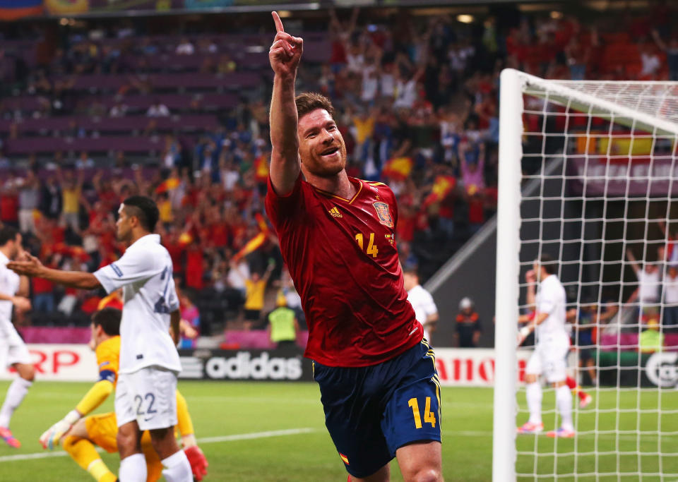 Xabi Alonso of Spain celebrates after scoring the first goal during the UEFA EURO 2012 quarter final match between Spain and France at Donbass Arena on June 23, 2012 in Donetsk, Ukraine. (Photo by Alex Livesey/Getty Images)