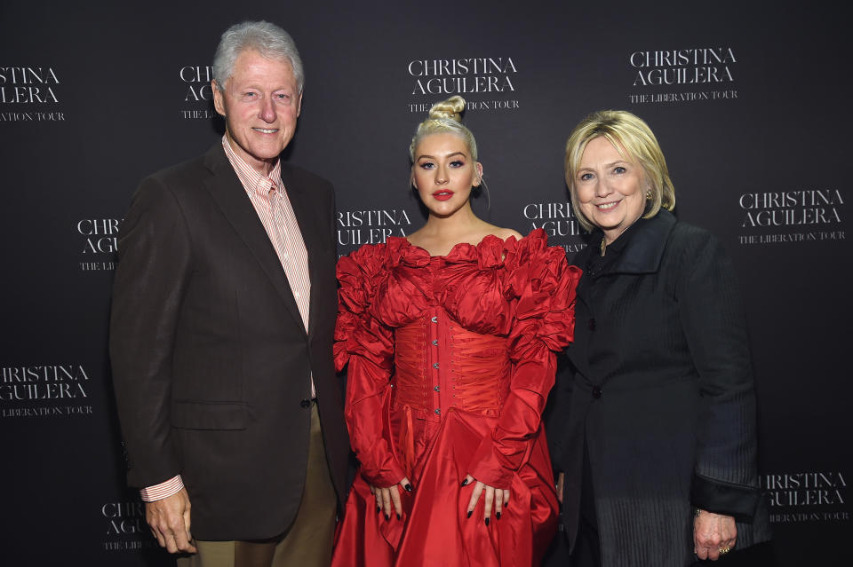 Former President Bill Clinton, Christina Aguilera, and former Secretary of State Hillary Clinton pose backstage at Radio City Music Hall on Oct. 3. (Photo: Kevin Mazur/Getty Images for Live Nation)