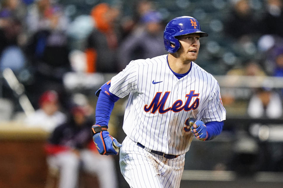 Brandon Nimmo, de los Mets de Nueva York, corre al conectar un jonrón durante el primer juego de una doble cartelera ante los Nacionales de Washington, el martes 4 de octubre de 2022 (AP Foto/Frank Franklin II)