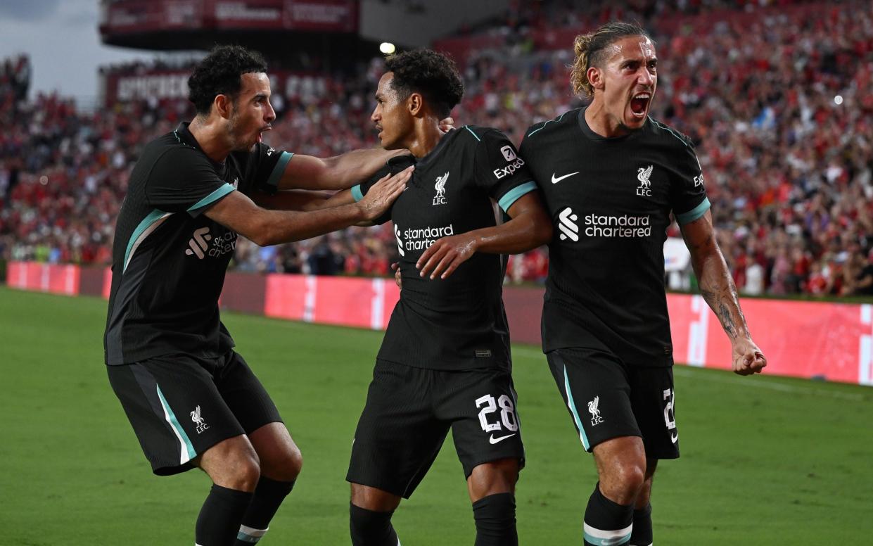 Liverpool celebrate the opening goal