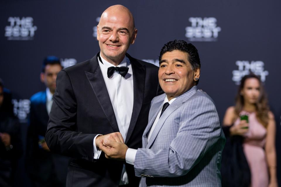 <p>Argentina World Cup winner Diego Maradona with FIFA chief Gianni Infantino </p>