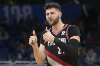 Portland Trail Blazers center Jusuf Nurkic (27) argues for a call from an official during the second half of an NBA basketball game against the Orlando Magic, Monday, Jan. 17, 2022, in Orlando, Fla. (AP Photo/Phelan M. Ebenhack)