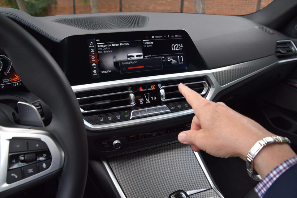 BMW 330i's  gesture control feature allows a driver to adjust volume without touching anything and instead by pointing, sweeping your hand or making circular motions with your finger.