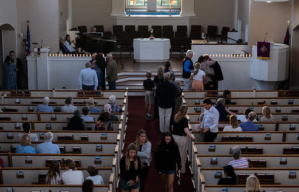 NASHVILLE, TN - MARCH 27:  People attend a vigil at Woodmont Christian for those who were killed in a mass shooting at The Covenant School on March 27, 2023 in Nashville, Tennessee. According to initial reports, three students and three adults were killed by the shooter, a 28-year-old woman. The shooter was killed by police responding to the scene. (Photo by Seth Herald/Getty Images)