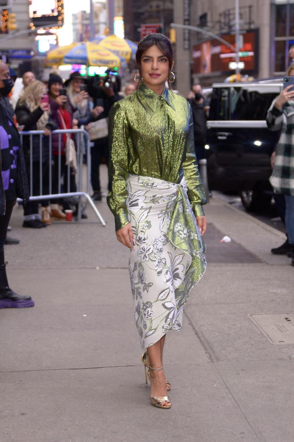 Priyanka Chopra Jonas wears green and silver dress on Good Morning America in New York City on December 16, 2021. - Credit: SplashNews.com