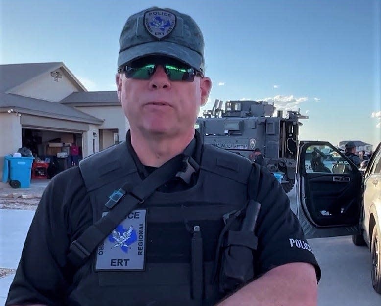 Socorro Police Chief David Burton speaks after a police raid of a migrant stash house on Flor Celosia Drive on Wednesday. He is shown in a still of a video made by the city of Socorro.