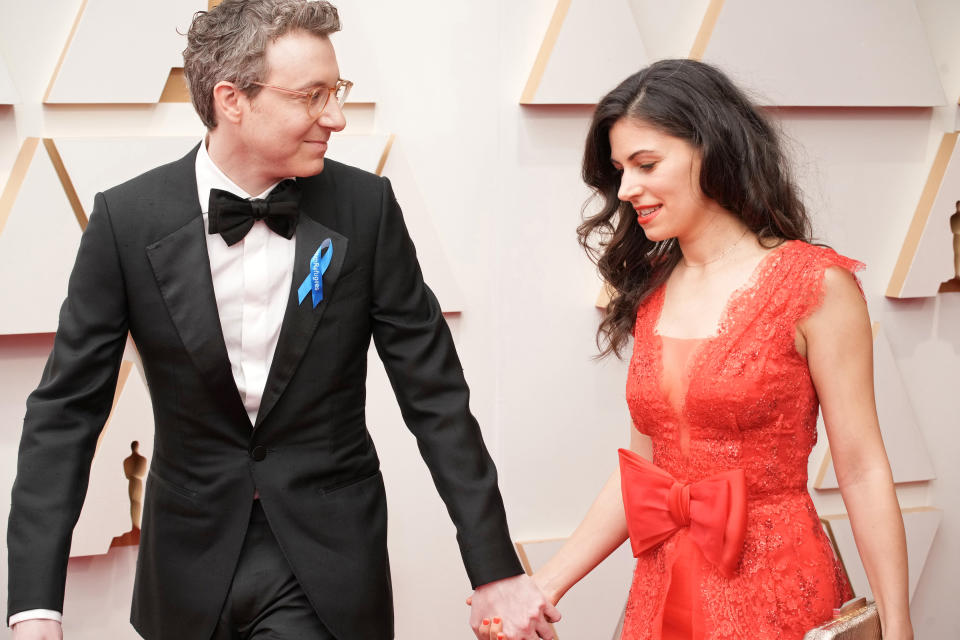 HOLLYWOOD, CALIFORNIA - MARCH 27: (L-R) Composer Nicholas Britell and Caitlin Sullivan attend the 94th Annual Academy Awards at Hollywood and Highland on March 27, 2022 in Hollywood, California. (Photo by Jeff Kravitz/FilmMagic)