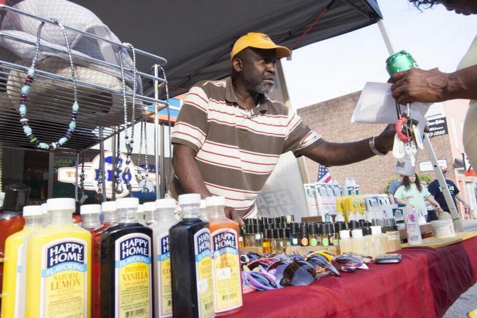 In this file photo, festival-goers enjoy music, food and vendors Friday evening at the Red Rose Festival in downtown Lancaster.